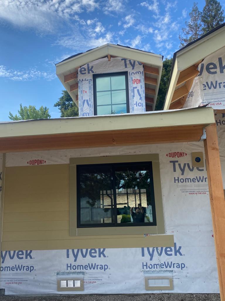 New home windows with film installed during construction
