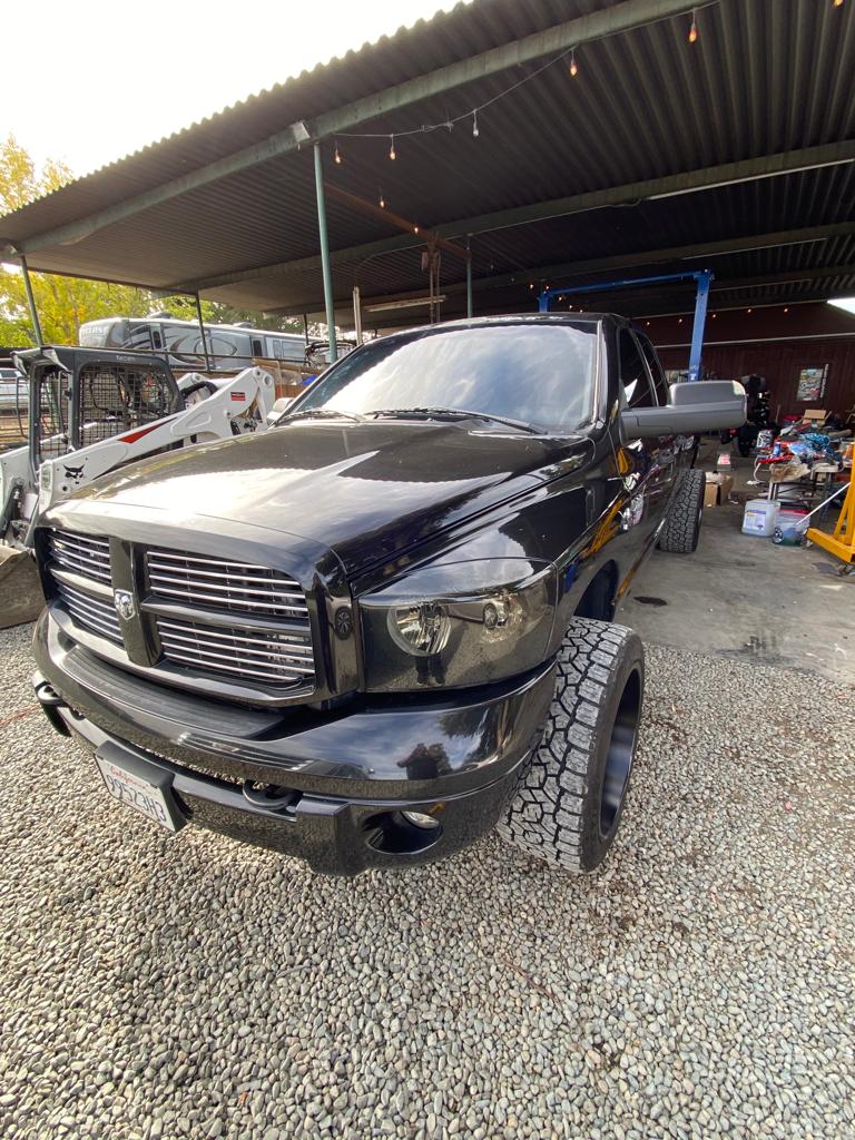 Black lifted Dodge Ram with tinted cab windows