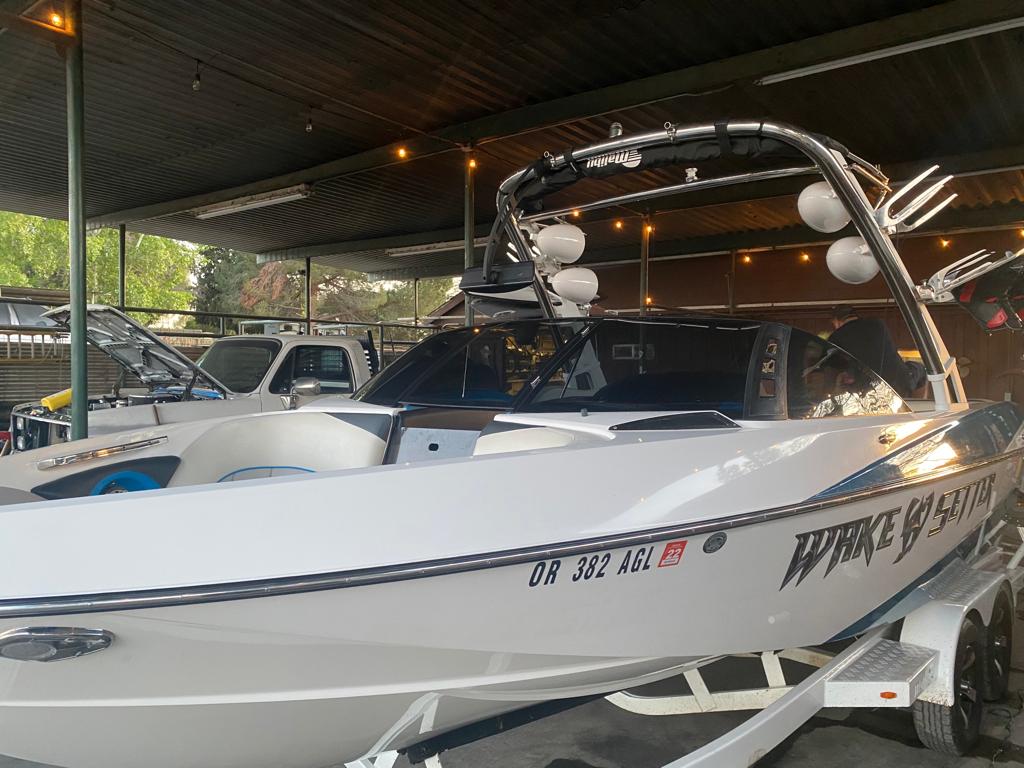 Malibu Wakesetter boat with tinted helm and cabin glass