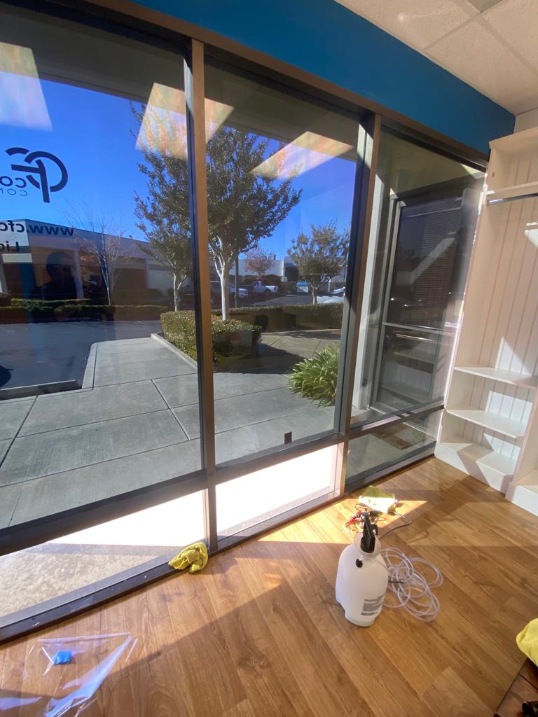 Office sliding glass door with solar film installed