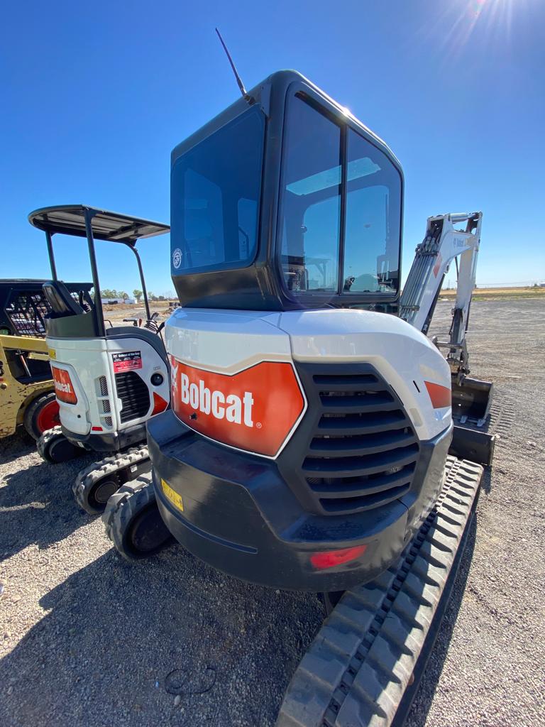 Bobcat excavator with dark tinted operator cab windows
